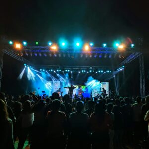 A crowd of people standing on top of a stage