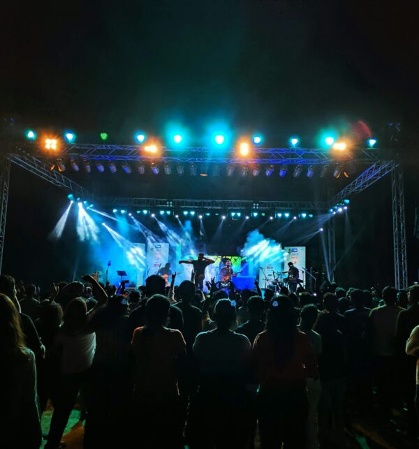 A crowd of people standing on top of a stage